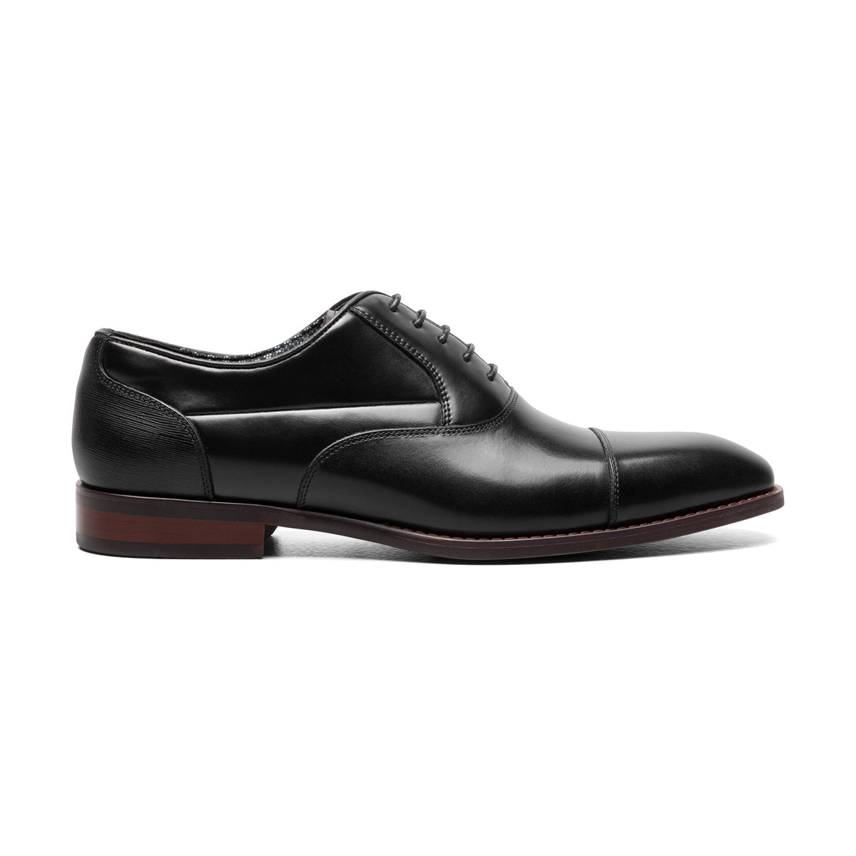 Black cap-toe dress shoe, inside view