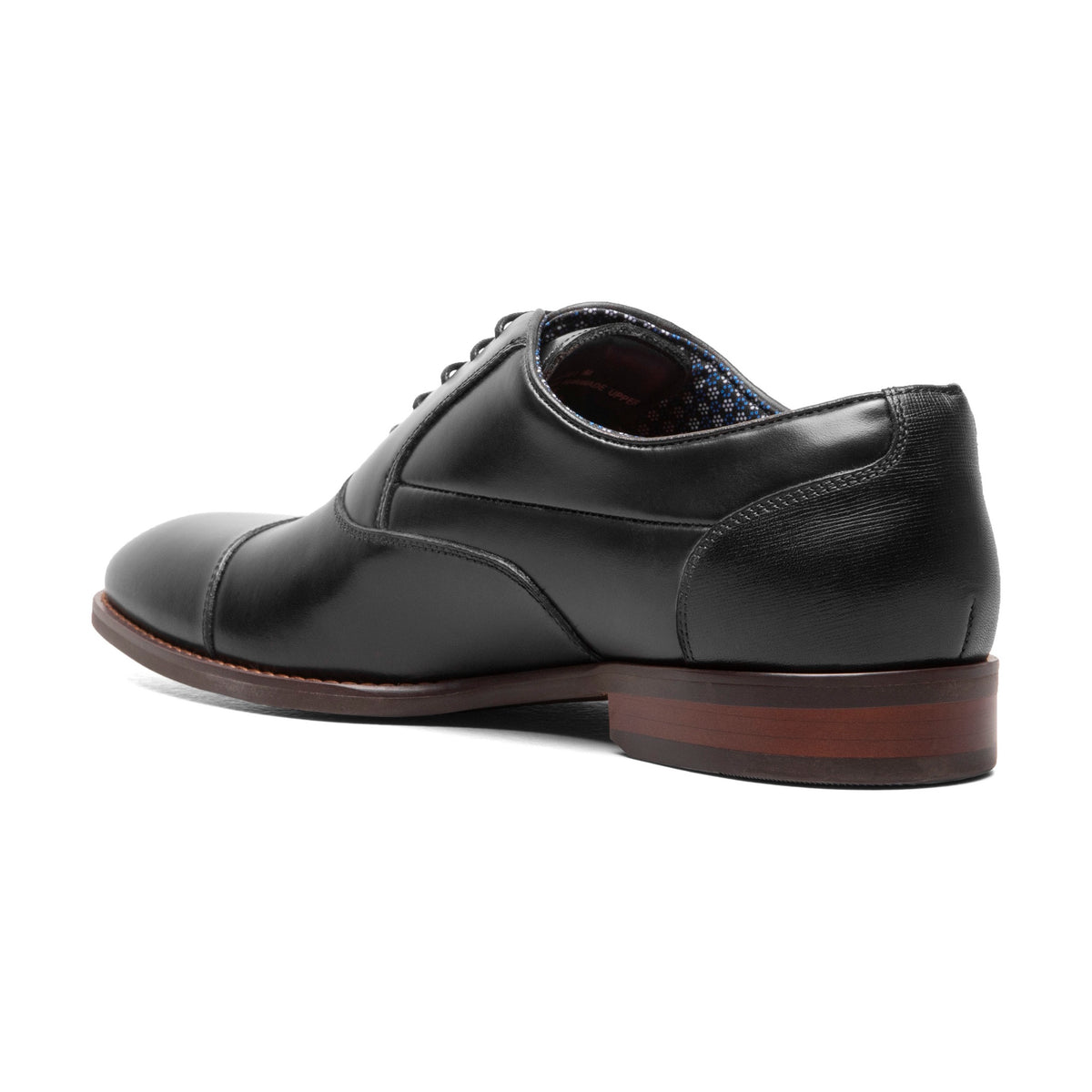 Black cap-toe dress shoe, back three-quarter view