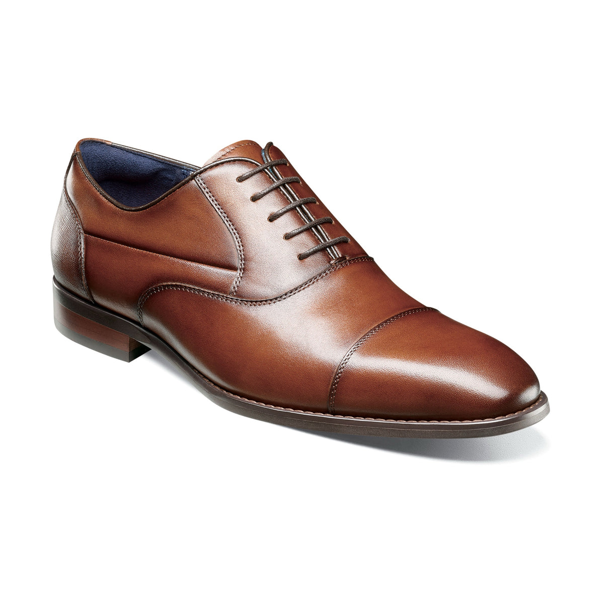 Cognac cap-toe dress shoe, three-quarter view