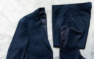 A close-up showing a suit jacket, vest, and pants to demonstrate what's included in the standard suit package for Modern Groom.
