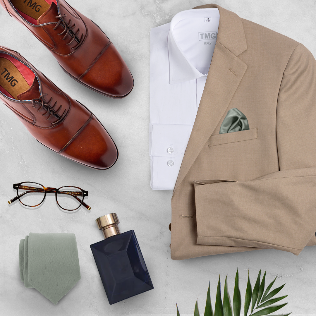 A flat lay of a wedding suit package from The Modern Groom